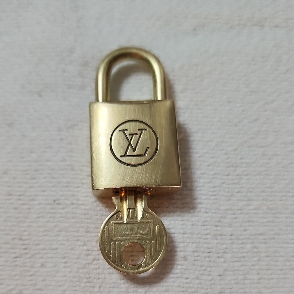 Louis Vuitton Gold Lock and Key Set